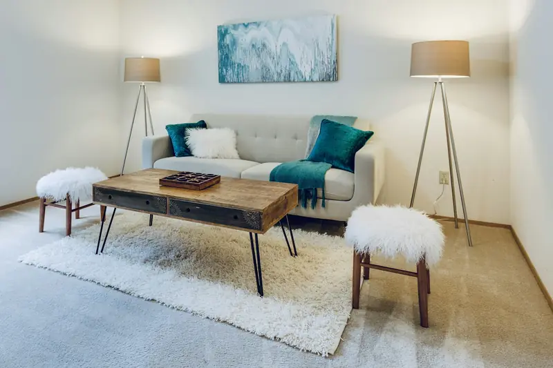 Living room with custom millwork and upholstered seating