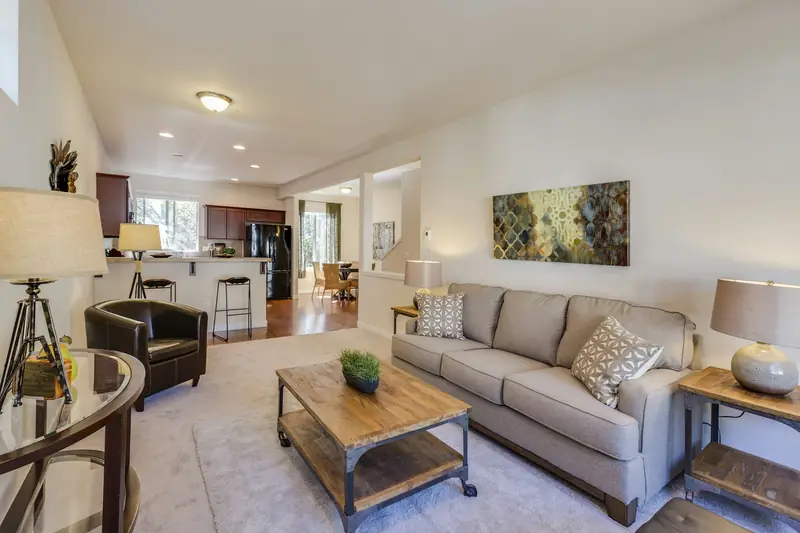 Neutral living room staged after a whole-home renovation